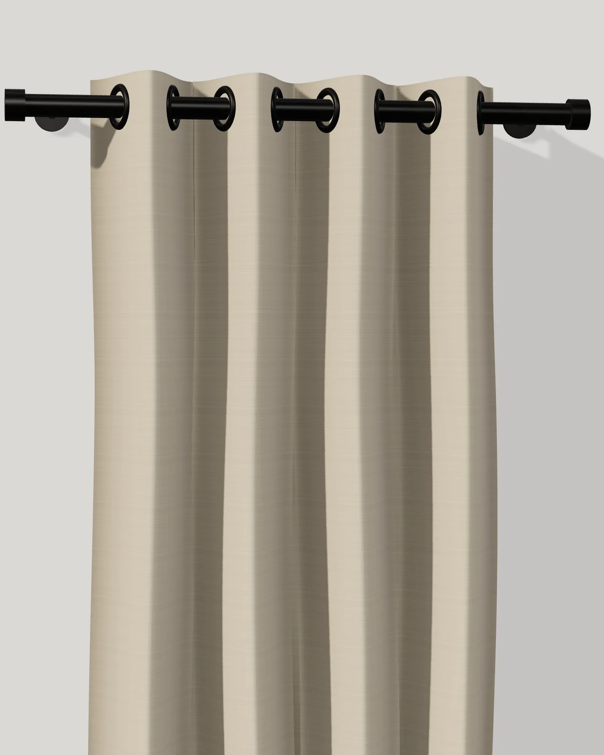 Linen grommet drapery with the rod running through metal rings set into the top of the panel.
