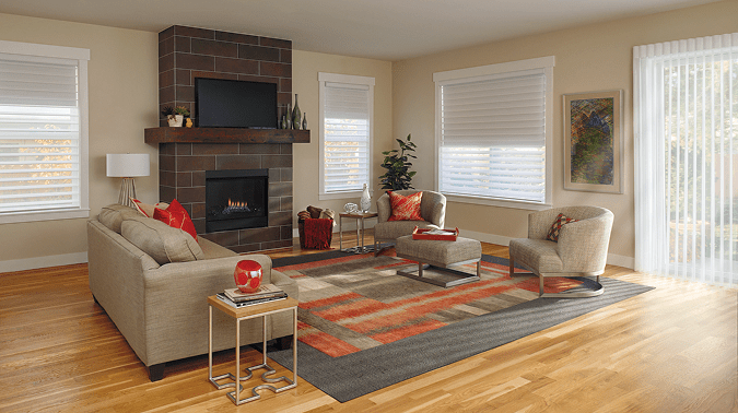 Horizontal window shades and vertical blinds installed in a living room
